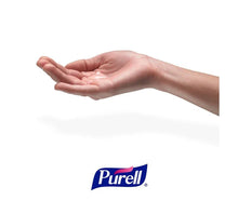Hand spreading sanitizer gel with Purell logo beneath