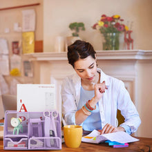 Purple mesh desk organizer set on a desk with pen cup and office tools near papers