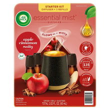 Essential mist diffuser starter kit box with black diffuser, refill bottles, and apples