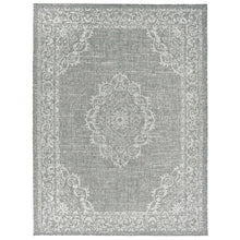 Indoor/outdoor rug flat view, gray with white damask-style medallion