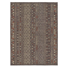 Rectangular geometric indoor/outdoor rug in dark gray with beige and rust