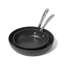 Nonstick skillet set with two black frying pans and silver handles, nested view