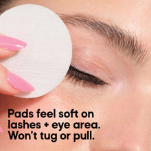 Micellar eye makeup remover pads close-up, white pad resting on closed eyelid