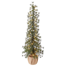 Tall artificial pine tree with warm LED lights, burlap-wrapped base