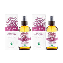Rose water toner set with two sprayer bottles and matching product boxes