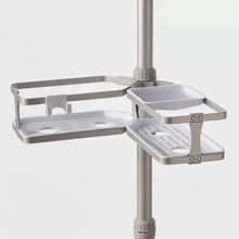 Gray corner tension pole caddy with two-tier shelves and side tray extensions