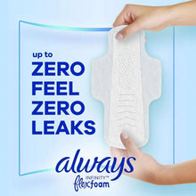 White Infinity FlexFoam heavy flow pad with textured center and curved wings