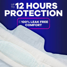 Extra heavy overnight pad with soft absorbent top layer