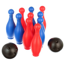 Bowling pins in blue and red with three black bowling balls