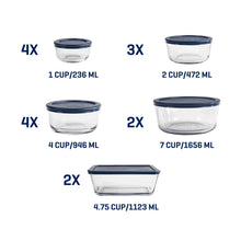 Assorted clear glass food storage containers with blue lids and multiple capacities