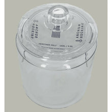 Clear glass jar with domed lid, Heritage Hill markings on top
