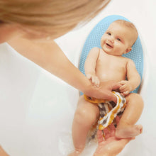 Aqua baby bathtub support seat holding an infant during bath time