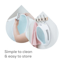 Aqua baby bathtub support seat held for use in a bathtub