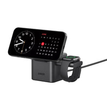 Black wireless charging stand with clock-style display and watch cradle