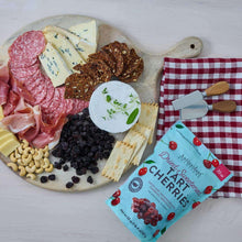 Dried tart cherries pouch in turquoise packaging with 20 oz label in view