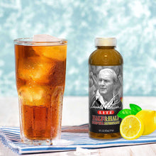 Half tea and half lemonade drink bottle with glass of amber beverage
