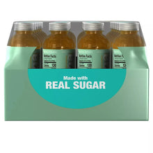 Pack of amber green tea bottles with 'Made with REAL SUGAR' on teal carton front