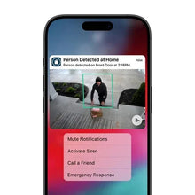 Phone screen showing person detected alert from a security camera and action menu