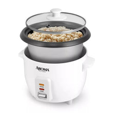 White Aroma rice cooker with open clear lid showing rice in the inner pot
