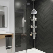 Light gray standing shower caddy with three shelves on a vertical pole