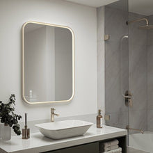 LED wall mirror with rounded-rectangle frame and warm backlit edge light