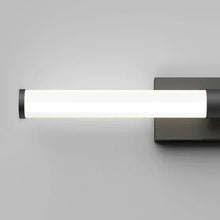 Chrome vanity light with frosted glass tube and side-mounted backplate