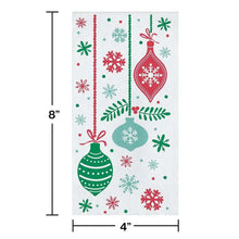 8" x 4" holiday paper napkin with ornaments, snowflakes, and dots in red, green, blue