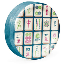Round paper plate with blue rim and Mahjong tile motifs