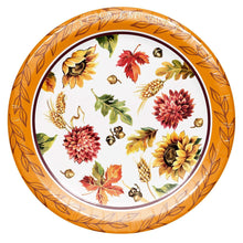 Orange oval paper plate with pumpkins, flowers, leaves, and gold accents