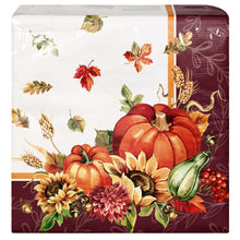 Square paper napkin with large pumpkin, leaves, and flowers in fall colors