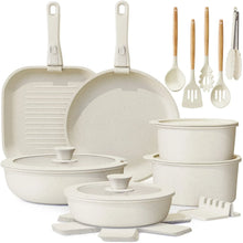 Cream white nonstick cookware set with detachable handles, multiple pots and pans