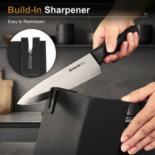 Kitchen knife with built-in sharpener block, hands holding a chef knife