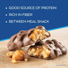 Caramel chocolate nut roll snack bar with bite pieces and caramel chunks