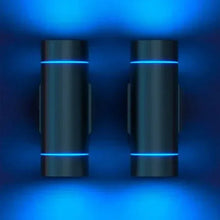 Two black cylindrical wall sconces with bright blue LED accents