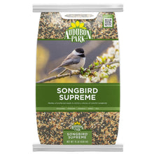 Bird seed bag with front label, perched bird photo, and top handle