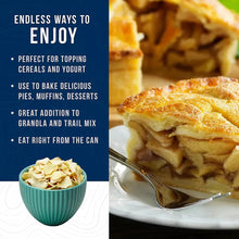 Baked apple pie with apple slices on plate, spoon and fork