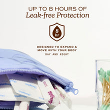 Organic tampon shown inside an opened blue protective pouch for leak-free coverage