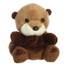 Brown mini sea otter plush with white muzzle, black eyes, and dark body