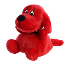 Red plush dog stuffed animal with black studded collar, seated smile