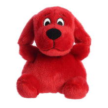 Red plush dog stuffed animal with big embroidered eyes and black nose, standing posture