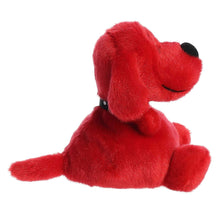 Red plush dog stuffed animal with black studded collar, side sitting pose