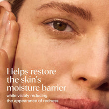 Face moisturizer smoothed on skin near eye and cheek