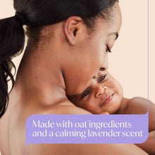 Caregiver holding baby close-up with Aveeno baby calming comfort bath and lotion branding