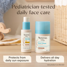 Two Aveeno baby face care products: face lotion and face cream with blue caps