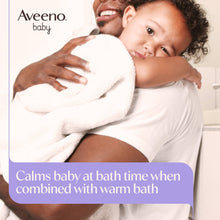 Aveeno baby calming comfort bath shown with parent hugging child wrapped in towel
