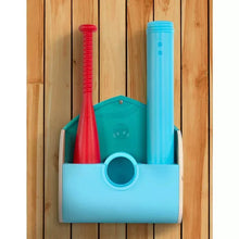 Tee-ball launcher with blue base, teal backboard, and red and blue poles