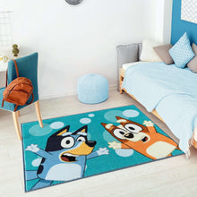 Teal indoor rug with cartoon dog and cat faces, soft youth decor floor mat