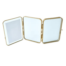 Three-panel gold metal folding picture frame with hinged clear glass fronts