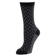 Single women's boot sock in black with zigzag knit pattern and dark toe