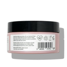 Back view of jasmine & rose body scrub tub with pink label, black lid, icons
